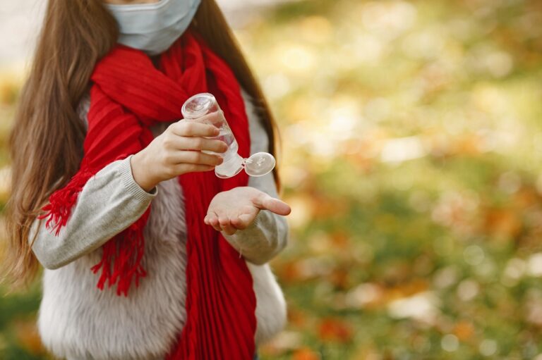 Little child walks outside in a mask